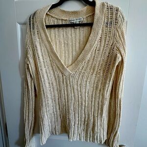 Beautiful statement sweater with accents of gold